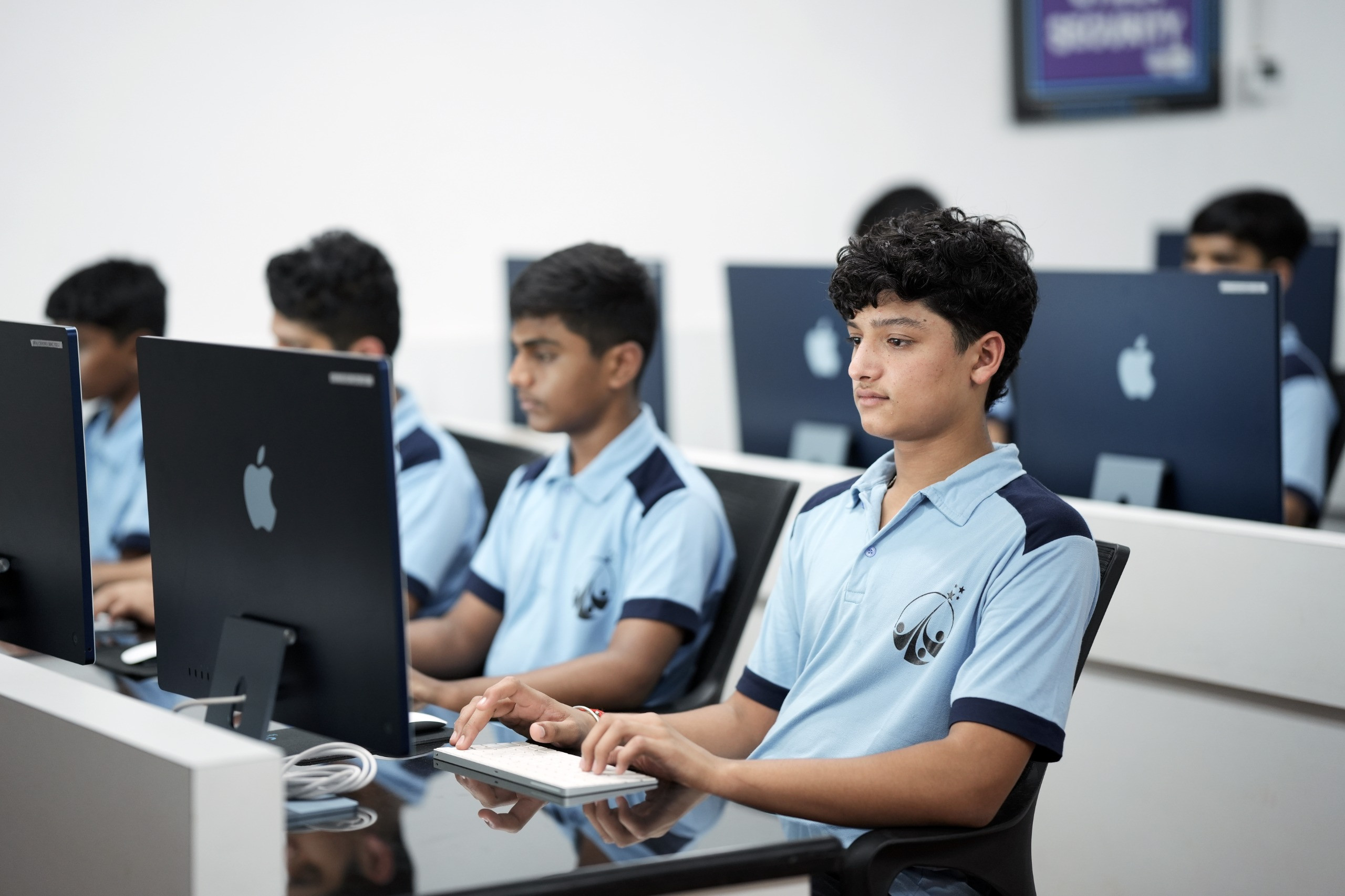 Students learning programming in a classroom setting